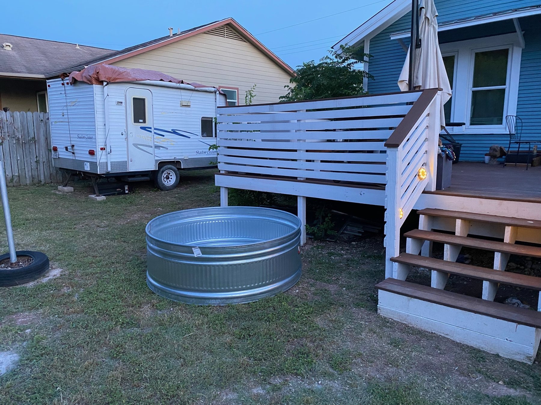 Backyard before the cowboy pool deck and pergola were built