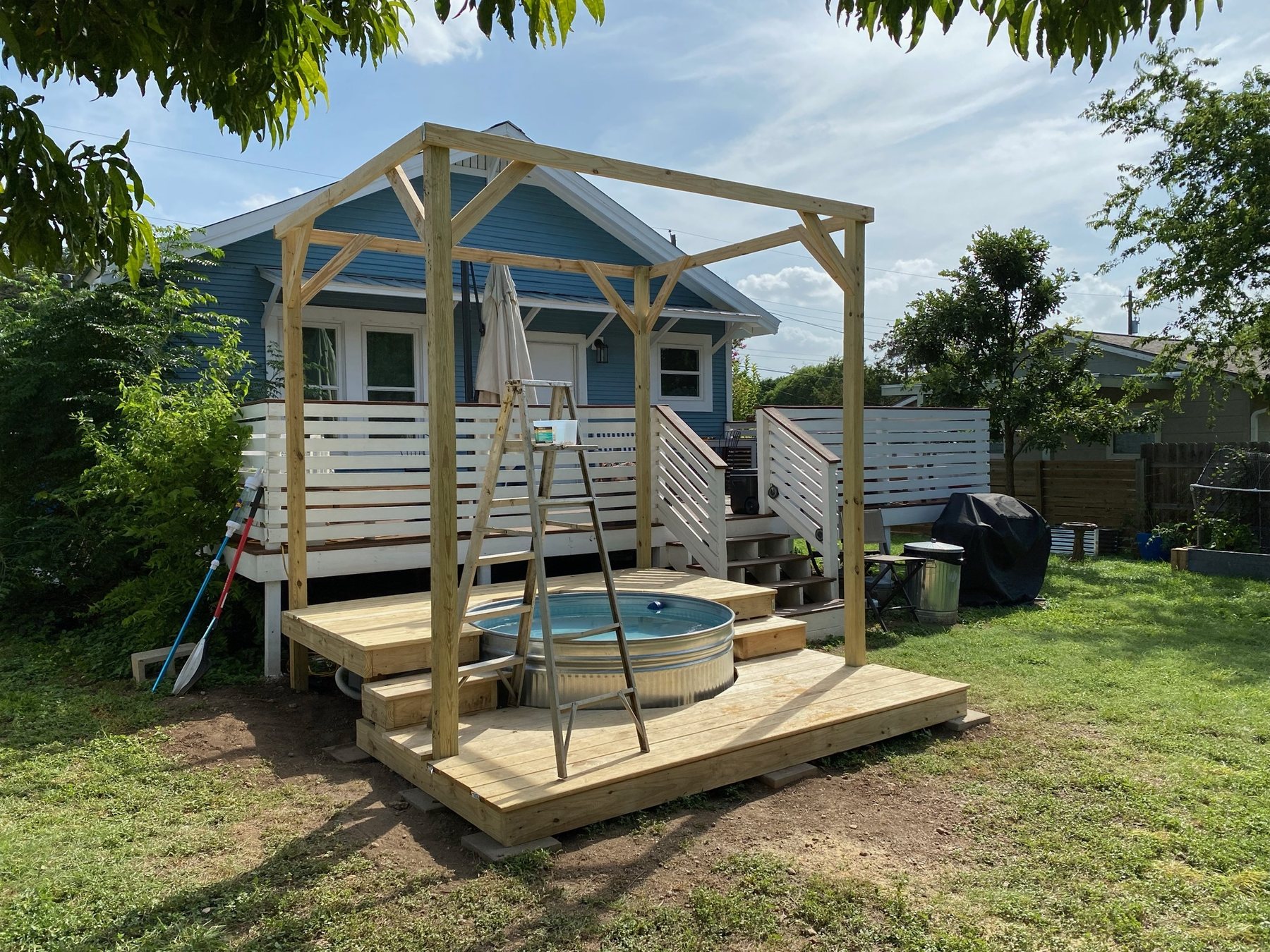 Cowboy pool deck and pergola during construction
