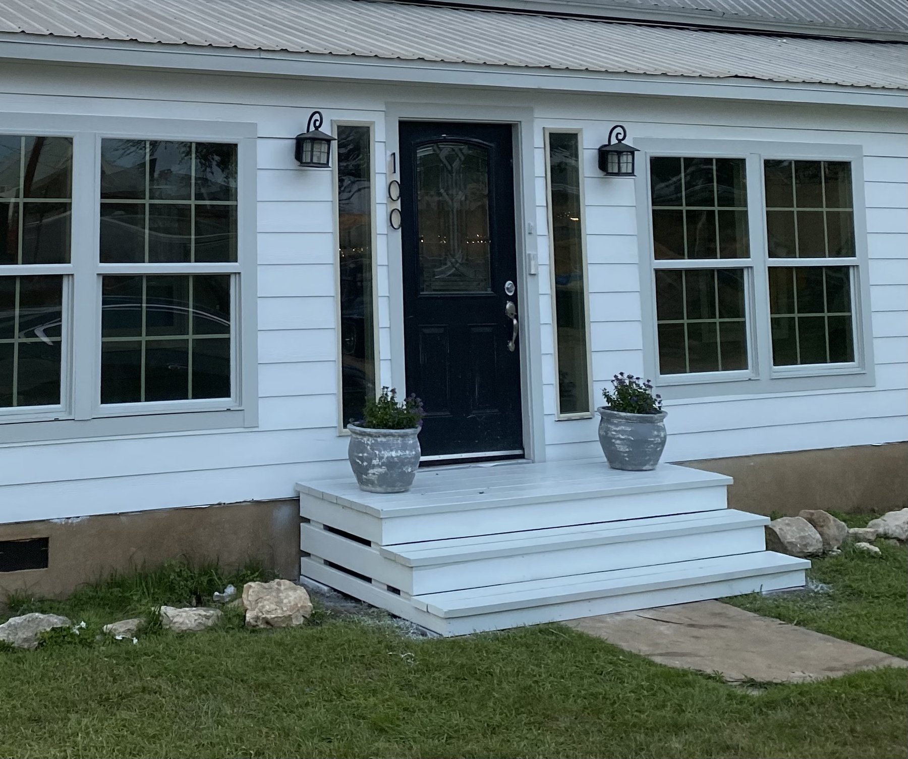 Finished painted front entry steps at the historic Buda home