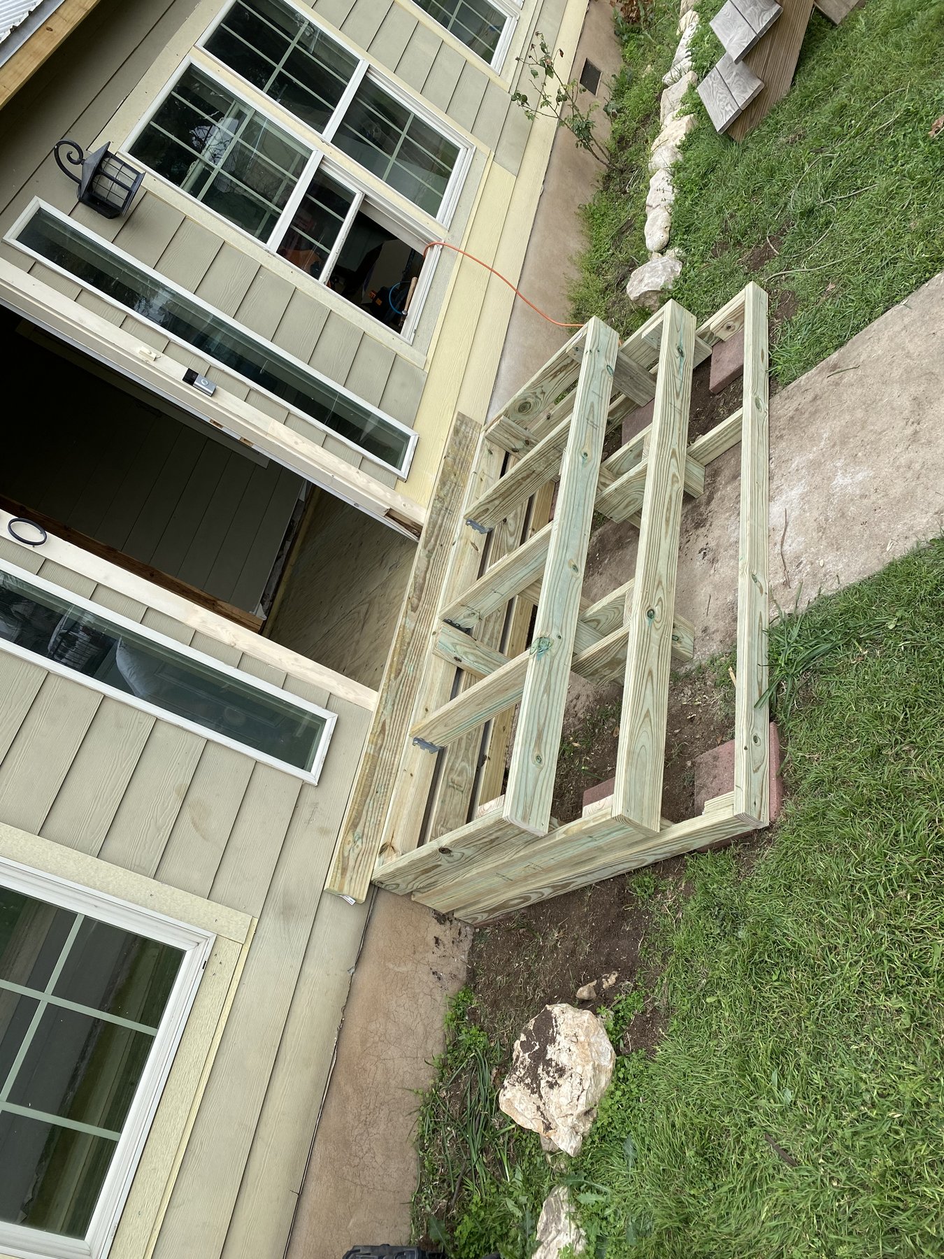 New front entry step framing during construction
