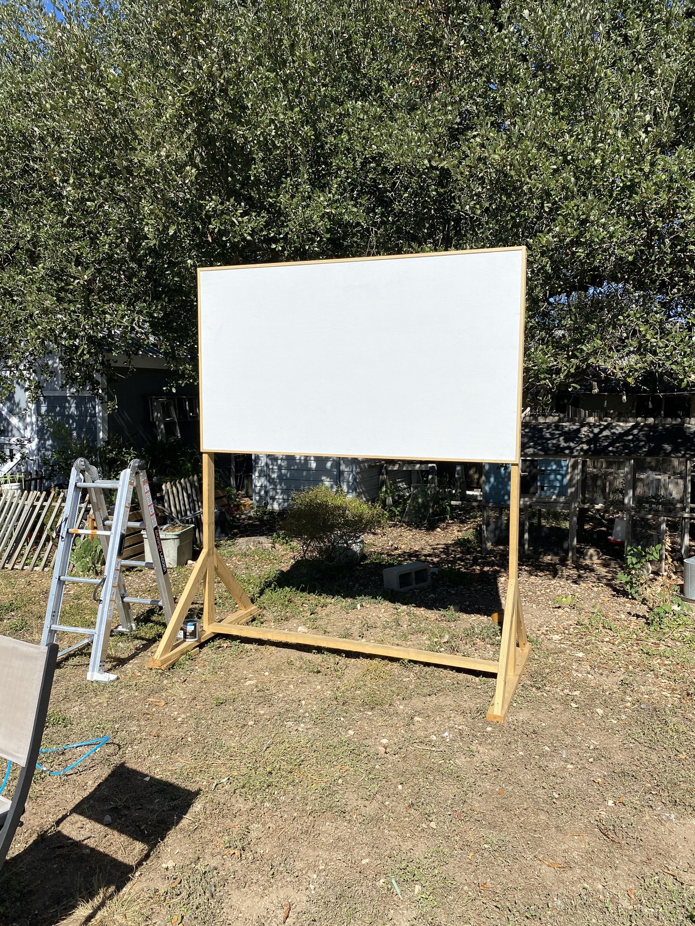 Finished freestanding all-wood outdoor projection screen
