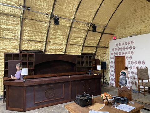 Stained hotel bar and wall unit for Above the Fold during final dressing