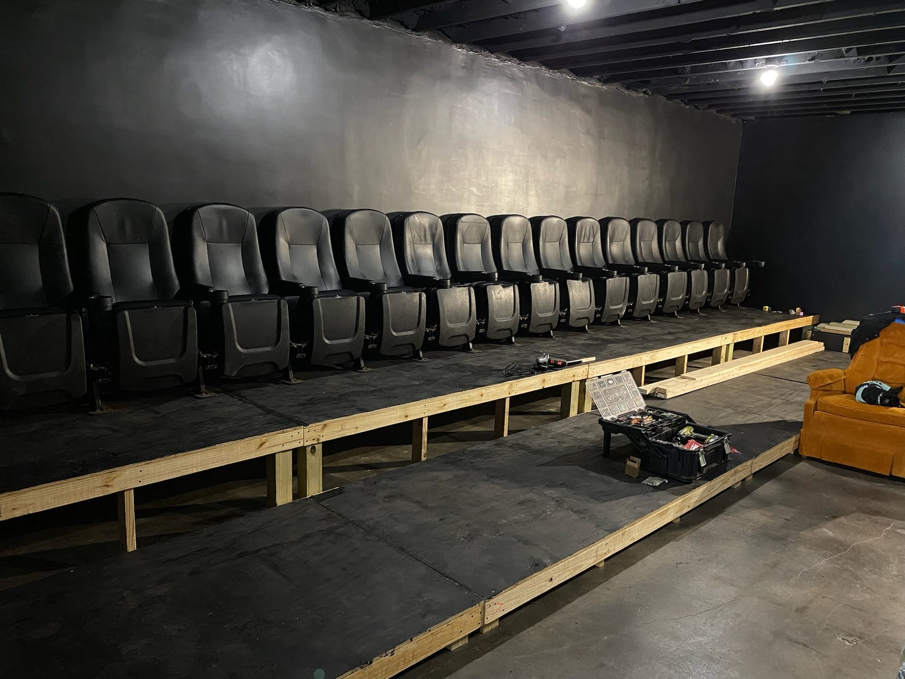 Early installation of repurposed cinema seats