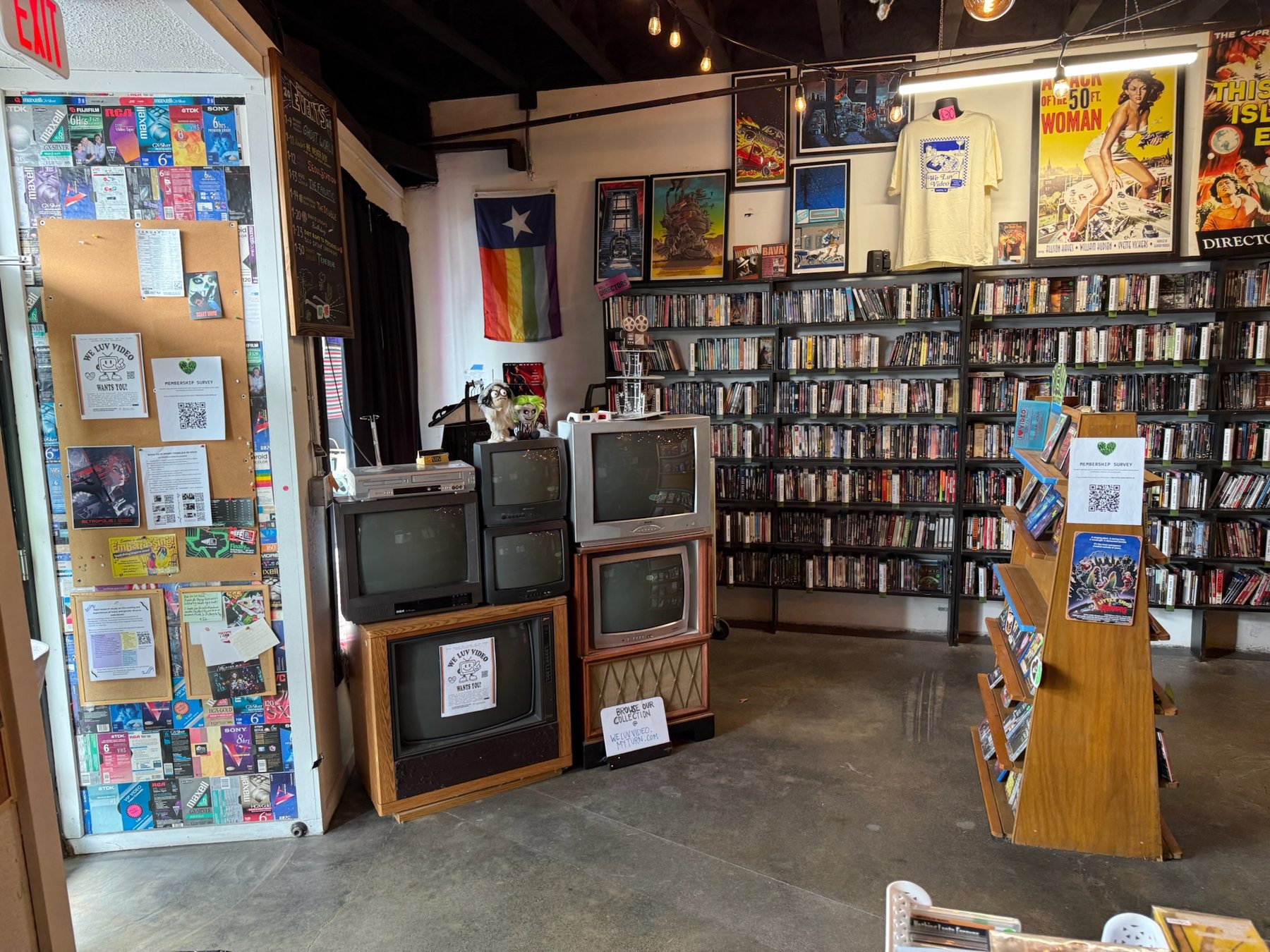 Original merchandise corner with stacked CRT televisions and loose display elements